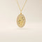 14k solid gold oval compass pendant necklace with pave moissanite stones around and a 4-point star design in the center. Elegant and symbolic gold jewelry. Perfect for daily wear.