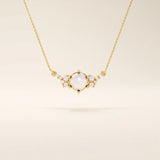 14k solid gold pearl necklace featuring moissanite clusters on both sides of the center pearl. Elegant and modern pearl jewelry. Perfect for minimalist daily wear.