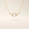 14k solid gold pearl necklace featuring moissanite clusters on both sides of the center pearl. Elegant and modern pearl jewelry. Perfect for minimalist daily wear.