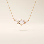 14k solid gold pearl necklace featuring moissanite clusters on both sides of the center pearl. Elegant and modern pearl jewelry. Perfect for minimalist daily wear.