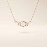 14k solid gold pearl necklace featuring moissanite clusters on both sides of the center pearl. Elegant and modern pearl jewelry. Perfect for minimalist daily wear.