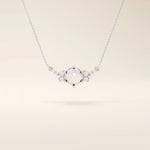 14k solid gold pearl necklace featuring moissanite clusters on both sides of the center pearl. Elegant and modern pearl jewelry. Perfect for minimalist daily wear.