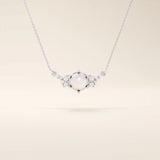 14k solid gold pearl necklace featuring moissanite clusters on both sides of the center pearl. Elegant and modern pearl jewelry. Perfect for minimalist daily wear.