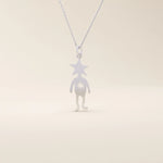 14k solid gold pendant necklace featuring a star-shaped head charm designed for little boys. Simple and charming everyday accessory.