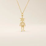 14k solid gold pendant necklace featuring a star-shaped head charm designed for little boys. Simple and charming everyday accessory.