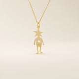 14k solid gold pendant necklace featuring a star-shaped head charm designed for little boys. Simple and charming everyday accessory.