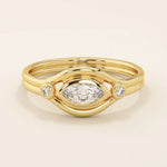 14k solid gold pinky signet ring featuring a bezel-set marquise moissanite in an evil eye design. A protective and stylish symbol in a minimalist ring.