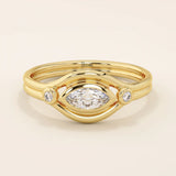 14k solid gold pinky signet ring featuring a bezel-set marquise moissanite in an evil eye design. A protective and stylish symbol in a minimalist ring.