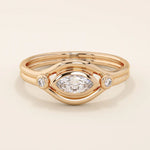 14k solid gold pinky signet ring featuring a bezel-set marquise moissanite in an evil eye design. A protective and stylish symbol in a minimalist ring.