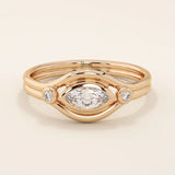 14k solid gold pinky signet ring featuring a bezel-set marquise moissanite in an evil eye design. A protective and stylish symbol in a minimalist ring.