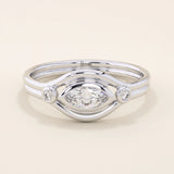 14k solid gold pinky signet ring featuring a bezel-set marquise moissanite in an evil eye design. A protective and stylish symbol in a minimalist ring.