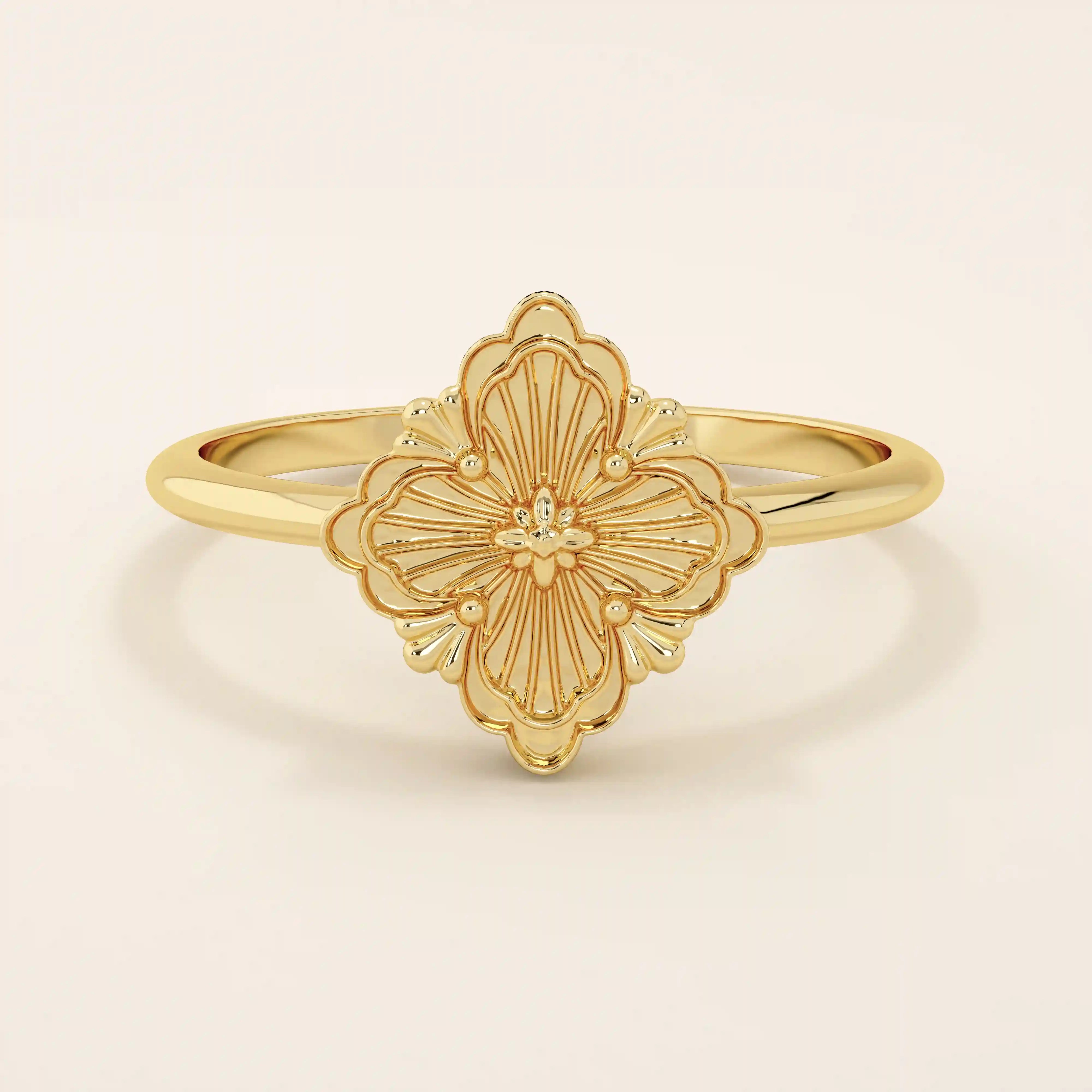 14k solid gold pinky signet ring featuring a clover-shaped motif. A minimalist and meaningful design for women’s everyday wear.