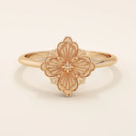 14k solid gold pinky signet ring featuring a clover-shaped motif. A minimalist and meaningful design for women’s everyday wear.