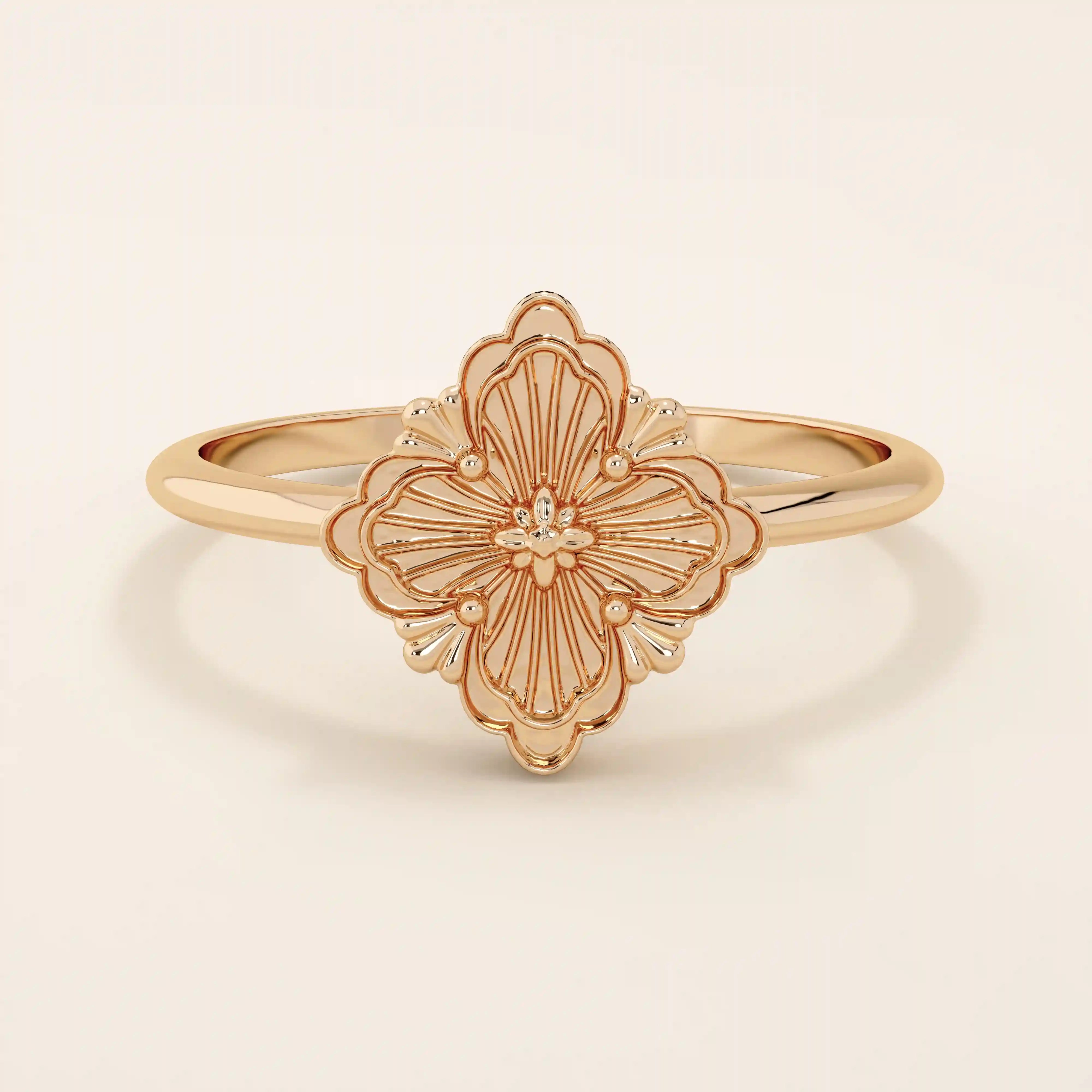 14k solid gold pinky signet ring featuring a clover-shaped motif. A minimalist and meaningful design for women’s everyday wear.
