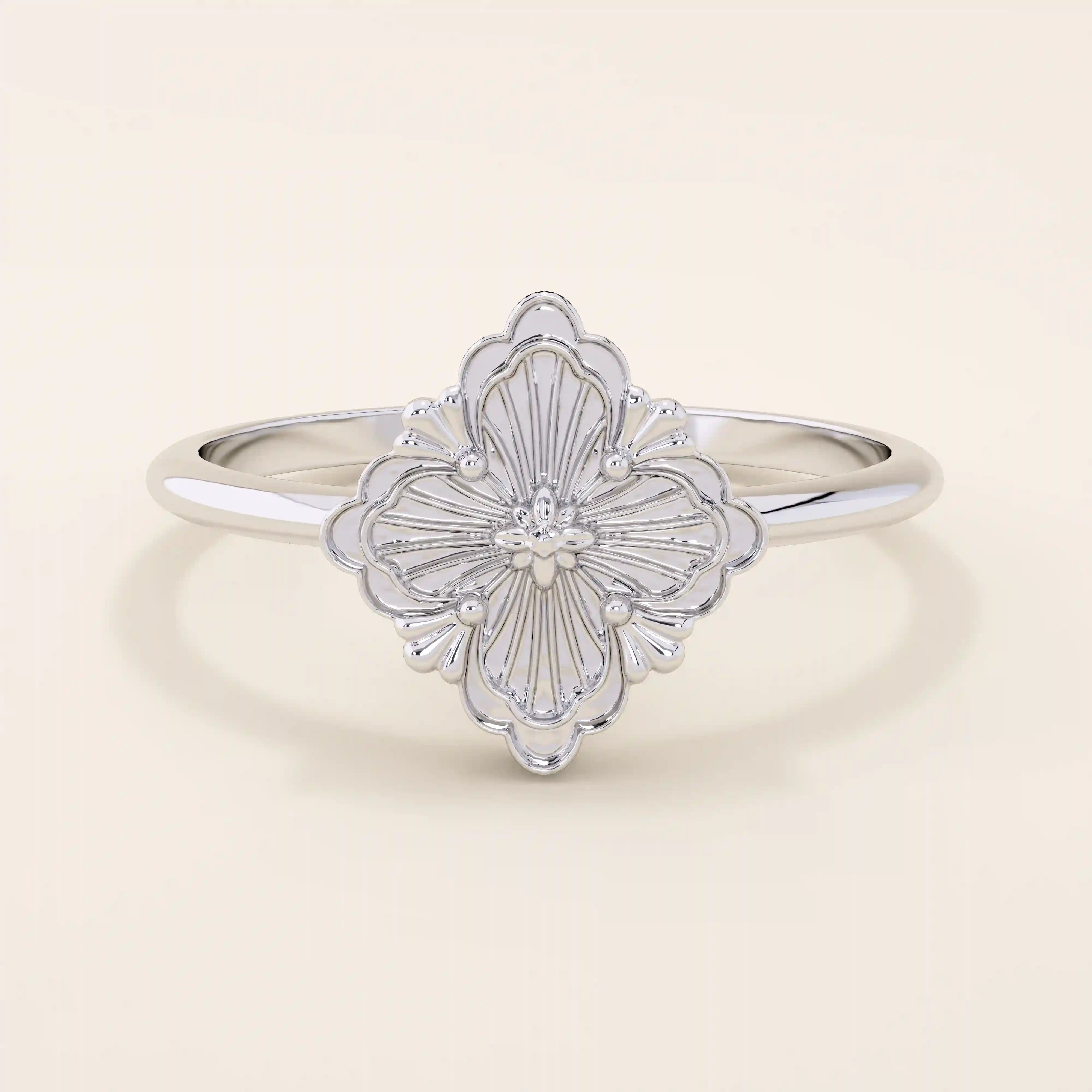 14k solid gold pinky signet ring featuring a clover-shaped motif. A minimalist and meaningful design for women’s everyday wear.