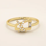 14k solid gold pinky signet ring with a unique geometric design, paved with sparkling moissanites. A modern and elegant statement piece.