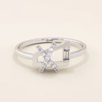 14k solid gold pinky signet ring with a unique geometric design, paved with sparkling moissanites. A modern and elegant statement piece.