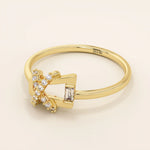 14k solid gold pinky signet ring with a unique geometric design, paved with sparkling moissanites. A modern and elegant statement piece.