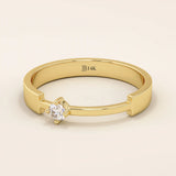 14k solid gold promise ring featuring a unique design with a single sparkling moissanite stone. Modern and elegant for everyday wear.