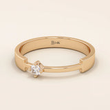 14k solid gold promise ring featuring a unique design with a single sparkling moissanite stone. Modern and elegant for everyday wear.