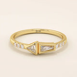 14k solid gold promise ring featuring tapered baguette and triangle-cut moissanites in bezel settings. A modern geometric design with elegant sparkle.
