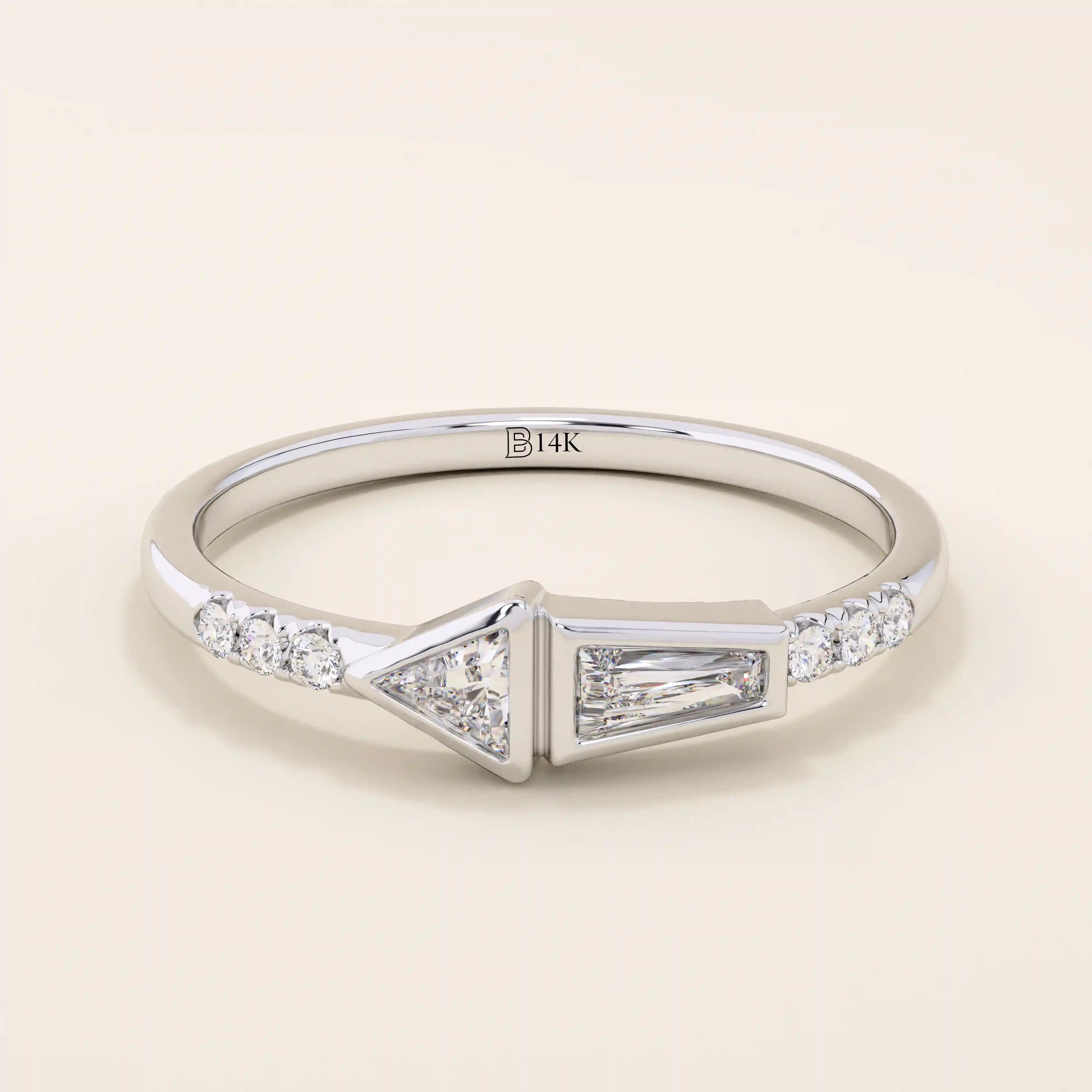 14k solid gold promise ring featuring tapered baguette and triangle-cut moissanites in bezel settings. A modern geometric design with elegant sparkle.