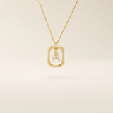 14k solid gold rectangle-shaped necklace featuring a personalized dangling initial letter. A modern and customizable everyday accessory.