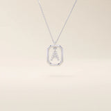 14k solid gold rectangle-shaped necklace featuring a personalized dangling initial letter. A modern and customizable everyday accessory.