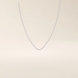14k solid gold rectangle link chain necklace with clean, structured lines. A bold yet minimal gold chain for everyday style. Perfect for wearing alone or layering.
