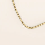 14k solid gold rectangle link chain necklace with clean, structured lines. A bold yet minimal gold chain for everyday style. Perfect for wearing alone or layering.