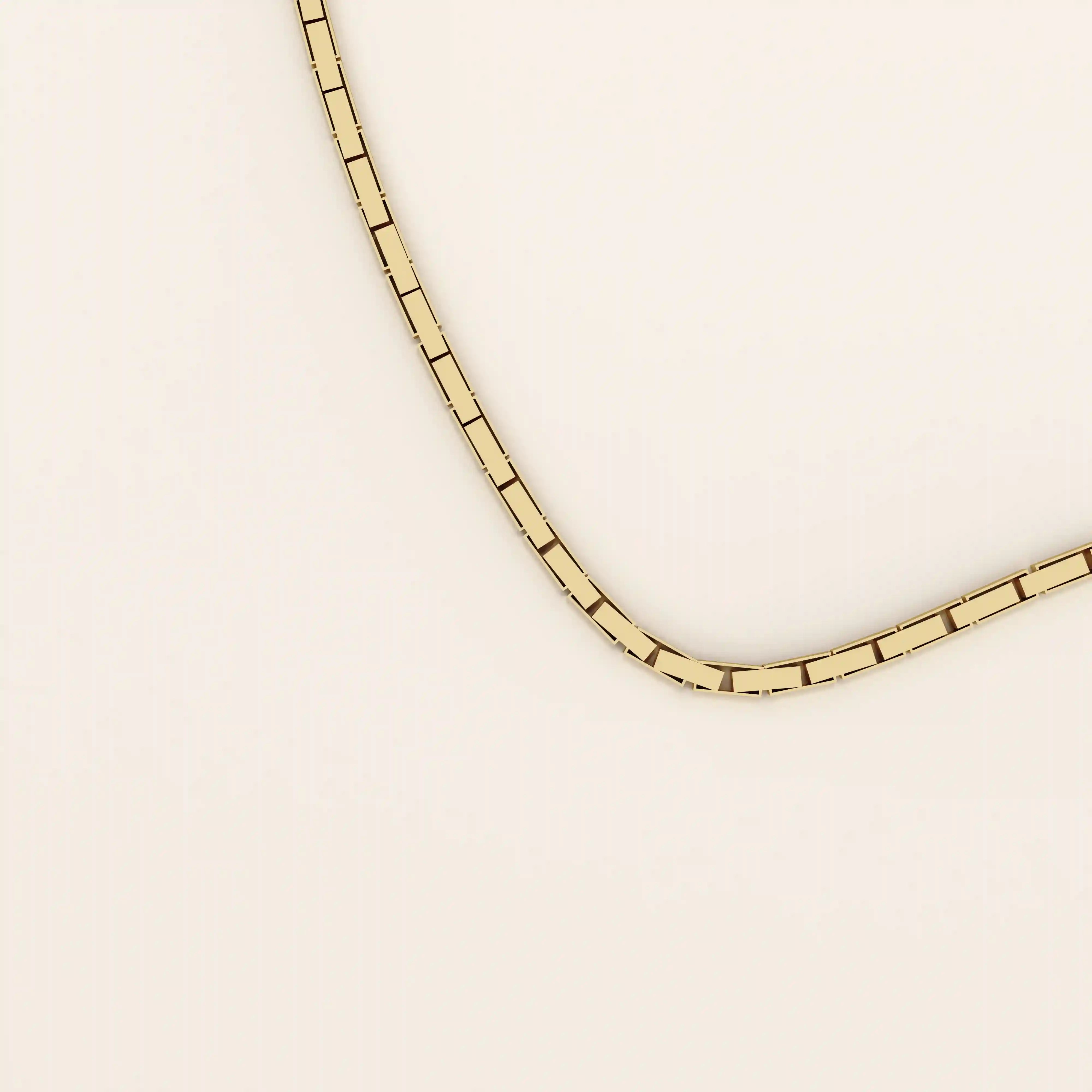 14k solid gold rectangle link chain necklace with clean, structured lines. A bold yet minimal gold chain for everyday style. Perfect for wearing alone or layering.