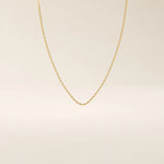 14k solid gold rectangle link chain necklace with clean, structured lines. A bold yet minimal gold chain for everyday style. Perfect for wearing alone or layering.
