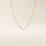 14k solid gold rectangle link chain necklace with clean, structured lines. A bold yet minimal gold chain for everyday style. Perfect for wearing alone or layering.