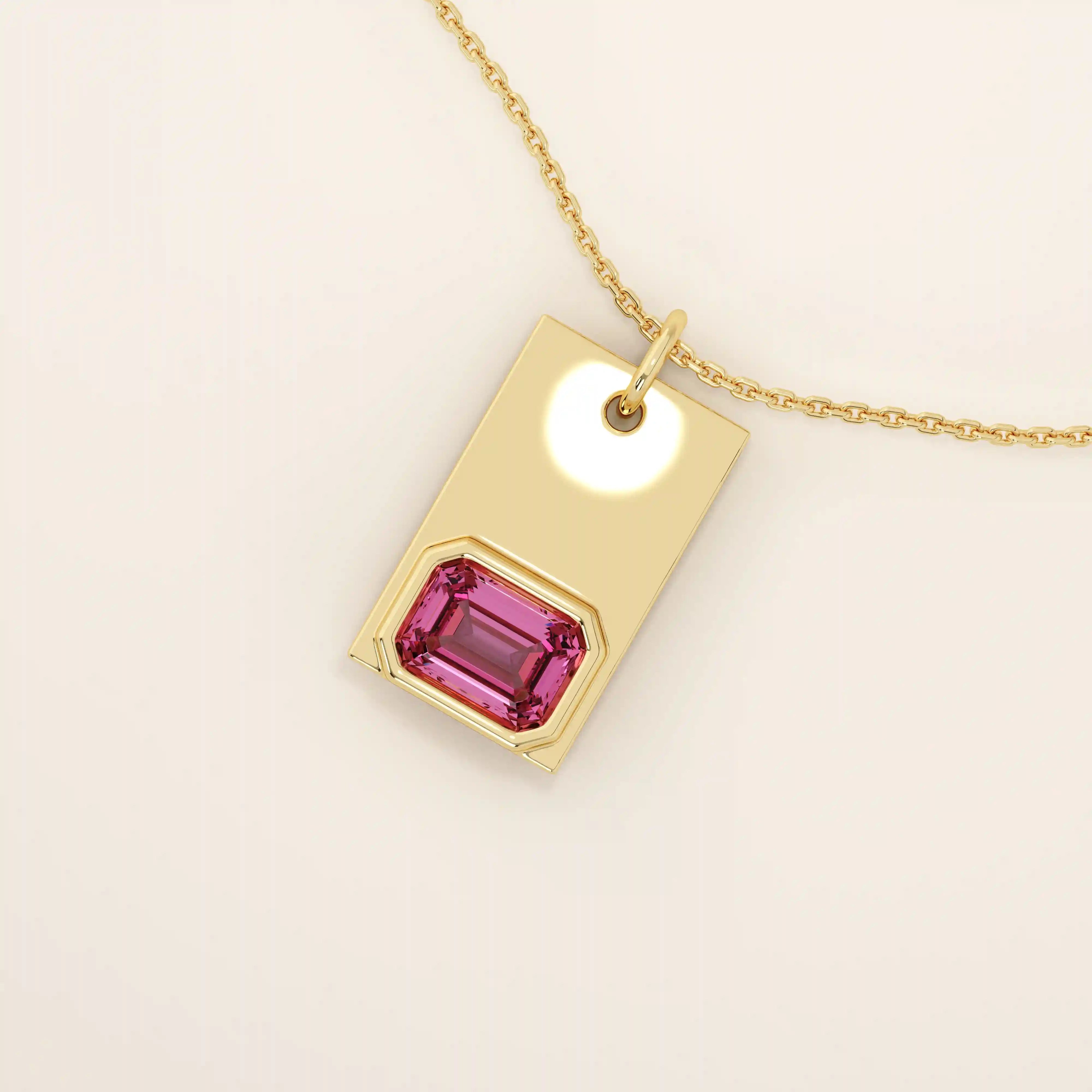 14k solid gold rectangle pendant with a bezel-set emerald-cut lab-grown ruby. A bold yet refined birthstone necklace with clean lines and rich red hue. Perfect for gifting or layering as meaningful fine jewelry.