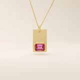 14k solid gold rectangle pendant with a bezel-set emerald-cut lab-grown ruby. A bold yet refined birthstone necklace with clean lines and rich red hue. Perfect for gifting or layering as meaningful fine jewelry.