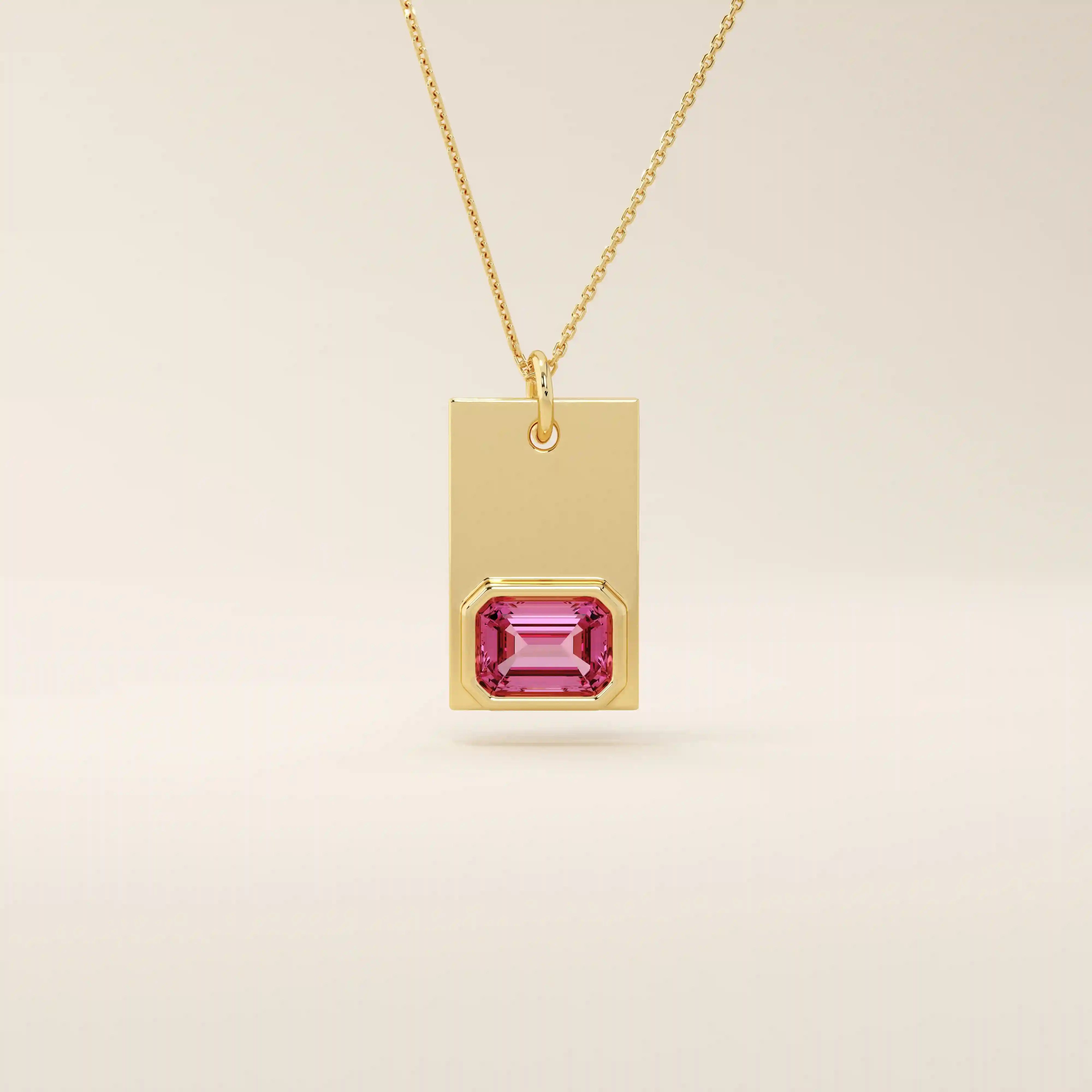 14k solid gold rectangle pendant with a bezel-set emerald-cut lab-grown ruby. A bold yet refined birthstone necklace with clean lines and rich red hue. Perfect for gifting or layering as meaningful fine jewelry.