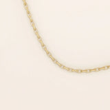 14k solid gold rolo chain necklace with round interlocking links and polished shine. A classic and sturdy gold chain. Great for everyday wear or stacking.