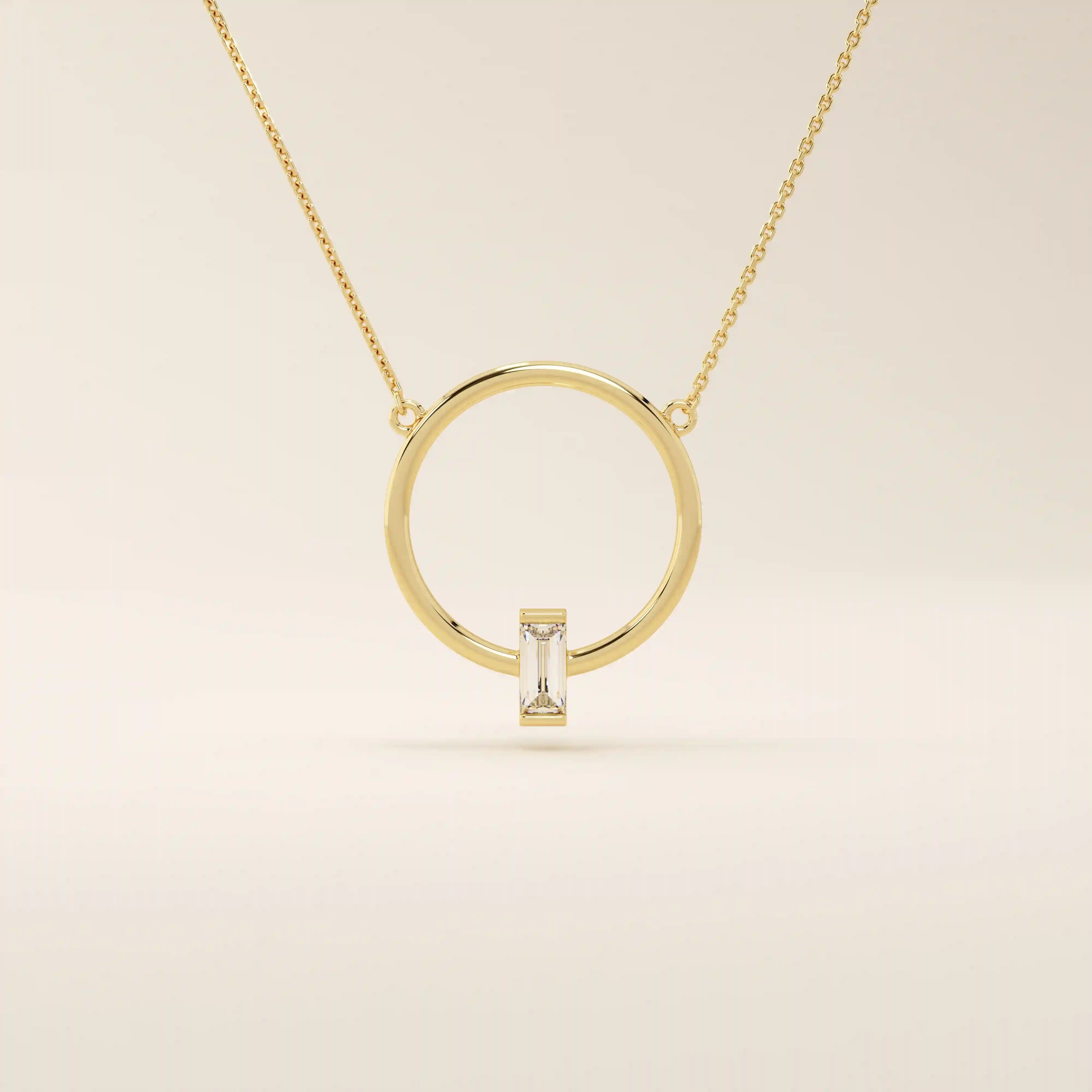 14k solid gold round necklace with a unique karma-inspired shape and central baguette-cut moissanite. Symbolic and modern gold jewelry. Ideal for minimalist everyday style.