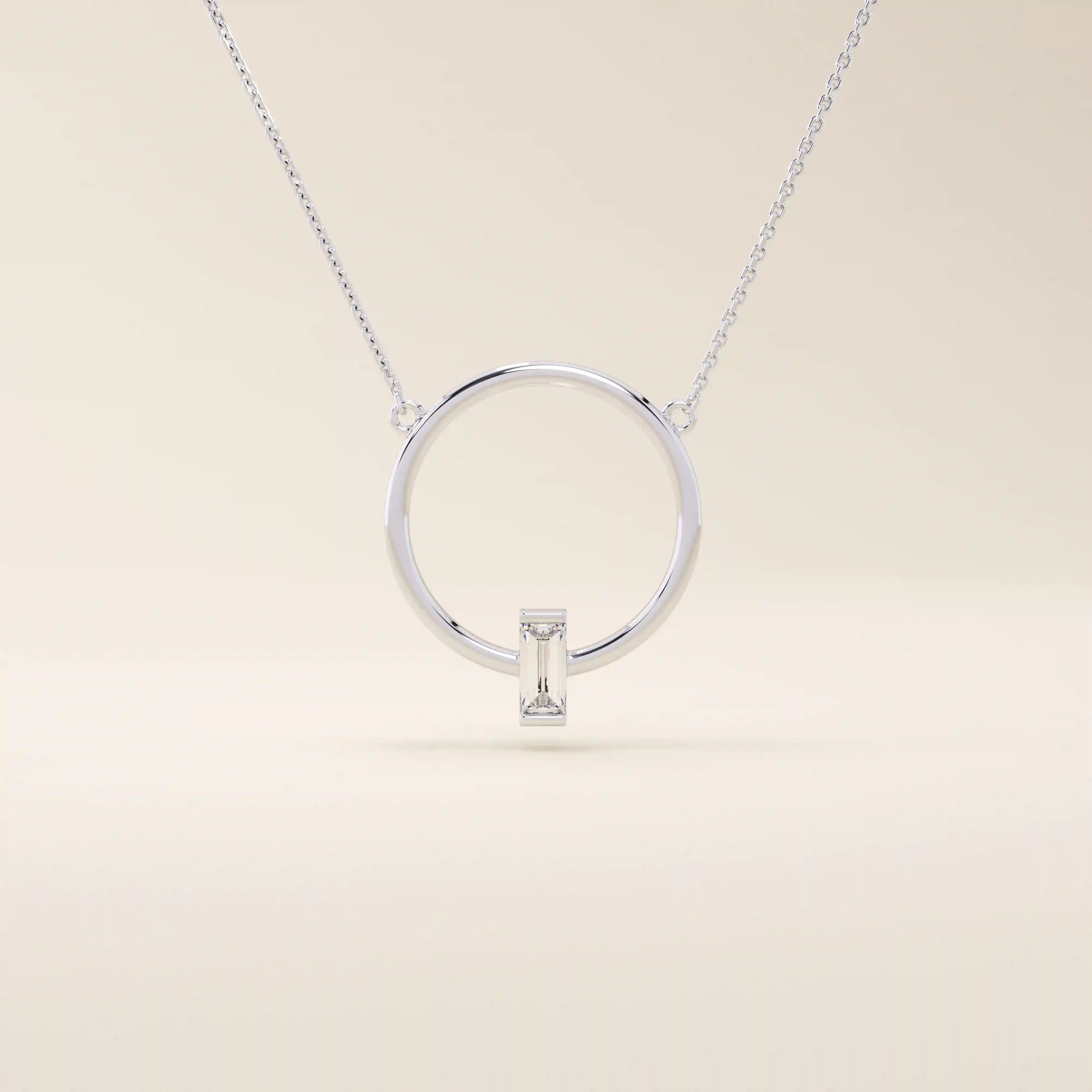 14k solid gold round necklace with a unique karma-inspired shape and central baguette-cut moissanite. Symbolic and modern gold jewelry. Ideal for minimalist everyday style.