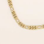 14k solid gold slim Figaro chain necklace with alternating short and long links. A classic and lightweight gold chain. Perfect for layering or daily wear.