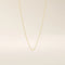 14k solid gold slim link chain necklace with a lightweight and polished finish. A delicate and timeless gold chain. Ideal for layering or wearing solo.