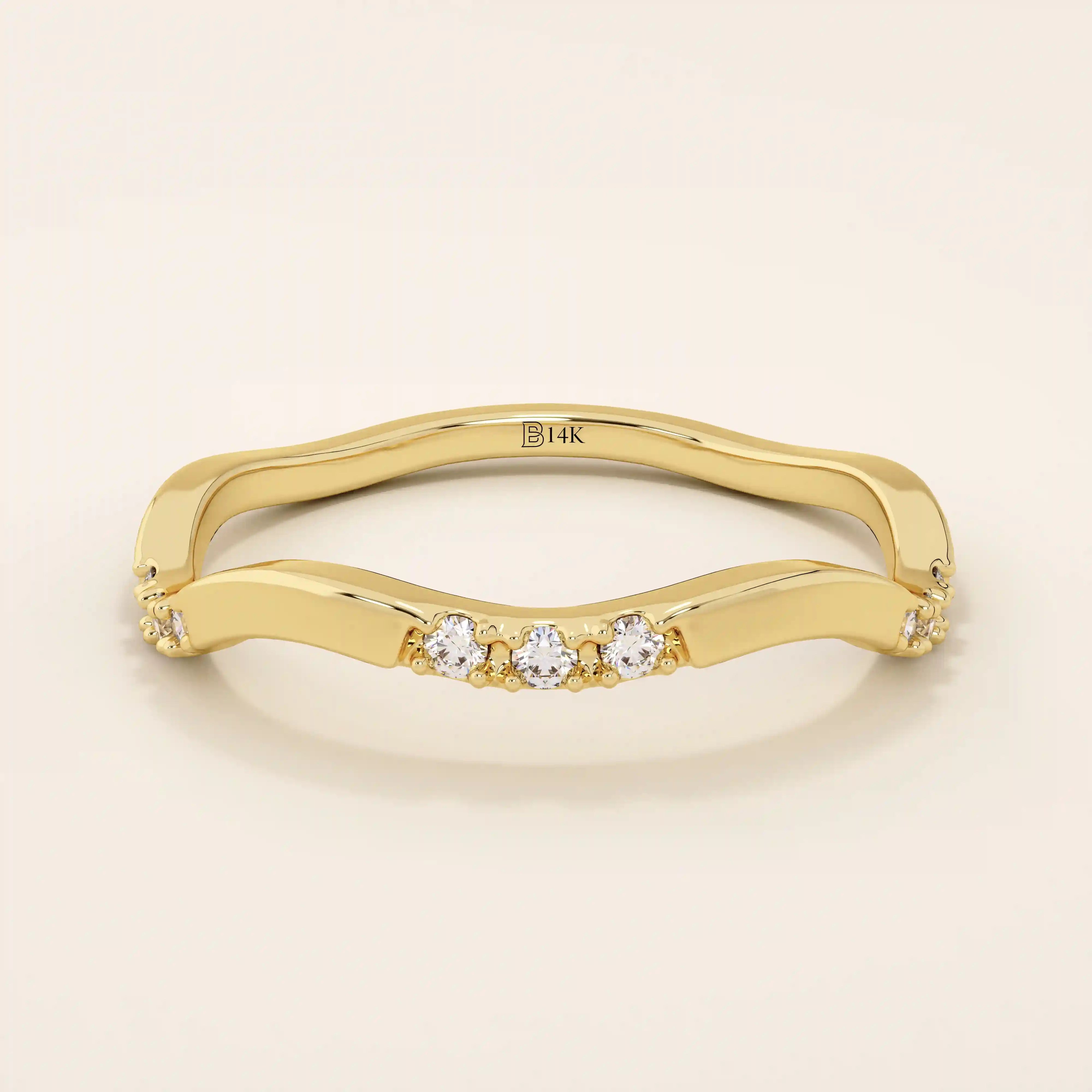 14k solid gold slim stacking ring with a delicate curvy band design and tiny moissanite accents. Minimalist and elegant for everyday wear.