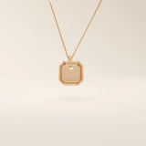 14k solid gold small octagon charm pendant with a minimalist shape and polished finish. A simple and timeless gold piece. Great for layering or everyday wear.