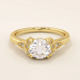14k solid gold solitaire engagement ring featuring intricate Celtic knot detailing and subtle accent moissanites. Unique and timeless design for modern brides.
