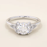 14k solid gold solitaire engagement ring featuring intricate Celtic knot detailing and subtle accent moissanites. Unique and timeless design for modern brides.