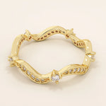 14k solid gold stacking ring featuring an ups and downs wave pattern. A modern and elegant band perfect for layering.