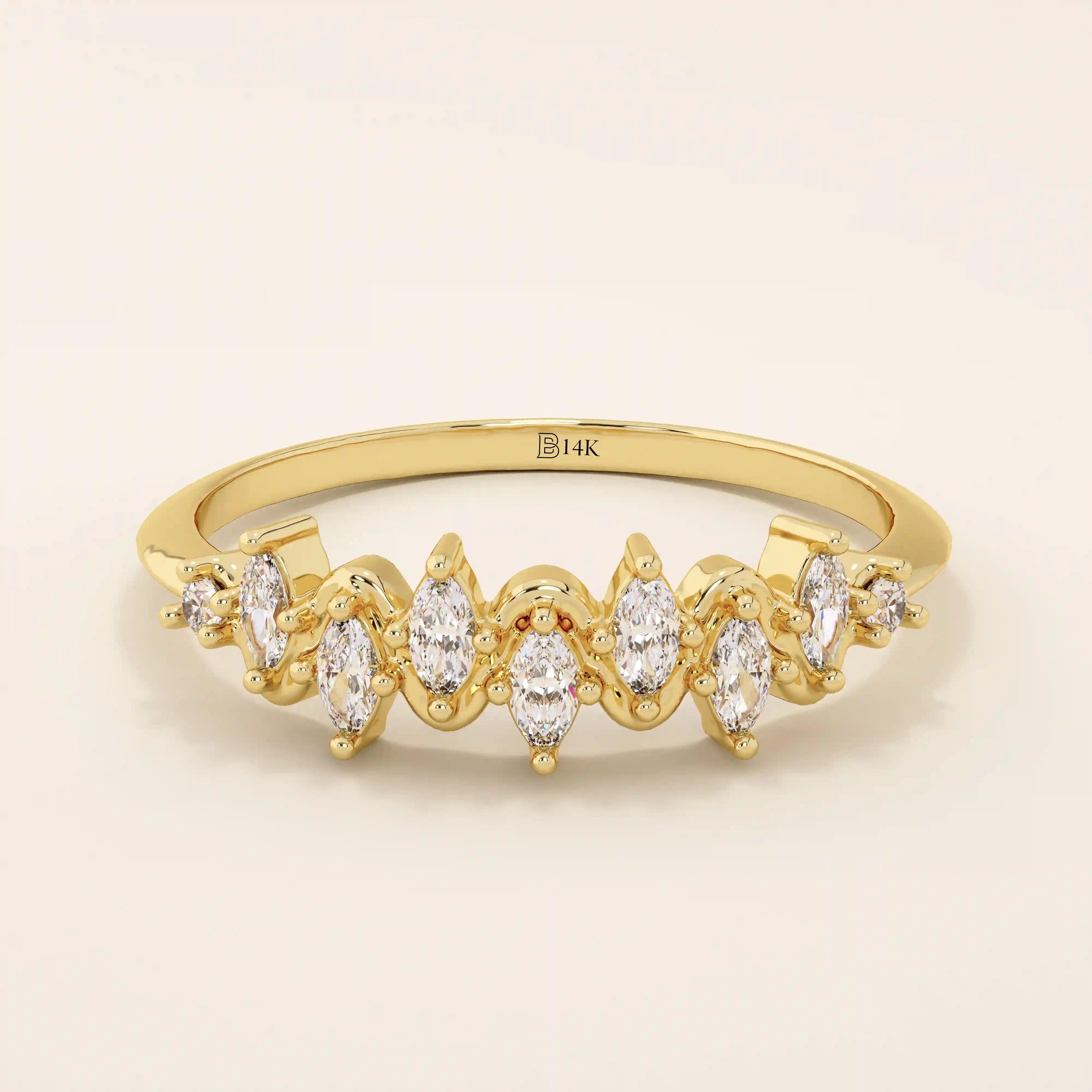 14k solid gold stacking ring with ups and downs design, paved with marquise-cut moissanites. A unique and elegant textured band.