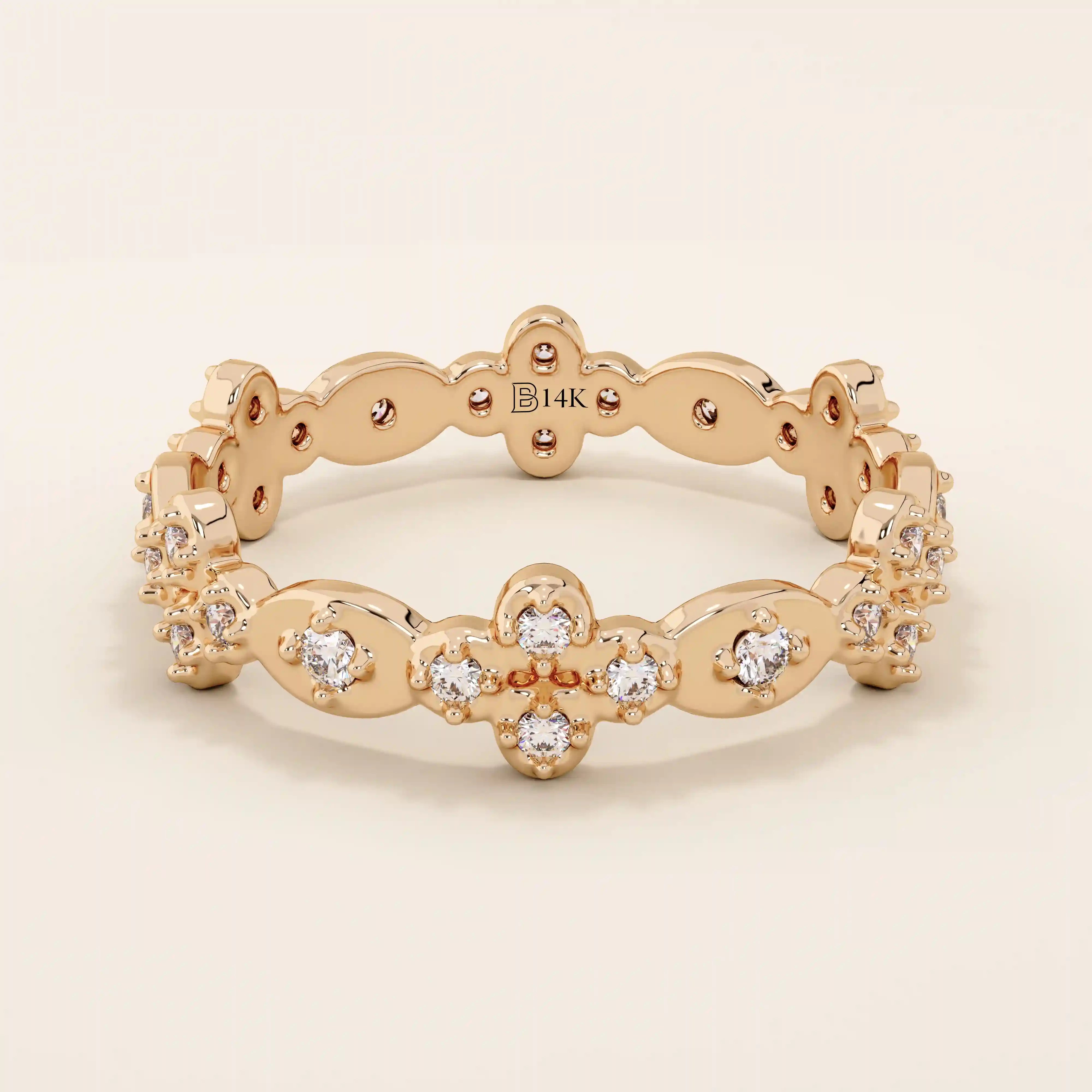 14k solid gold statement ring featuring a delicate leaf design with a sparkling moissanite. Minimalist and nature-inspired jewelry.