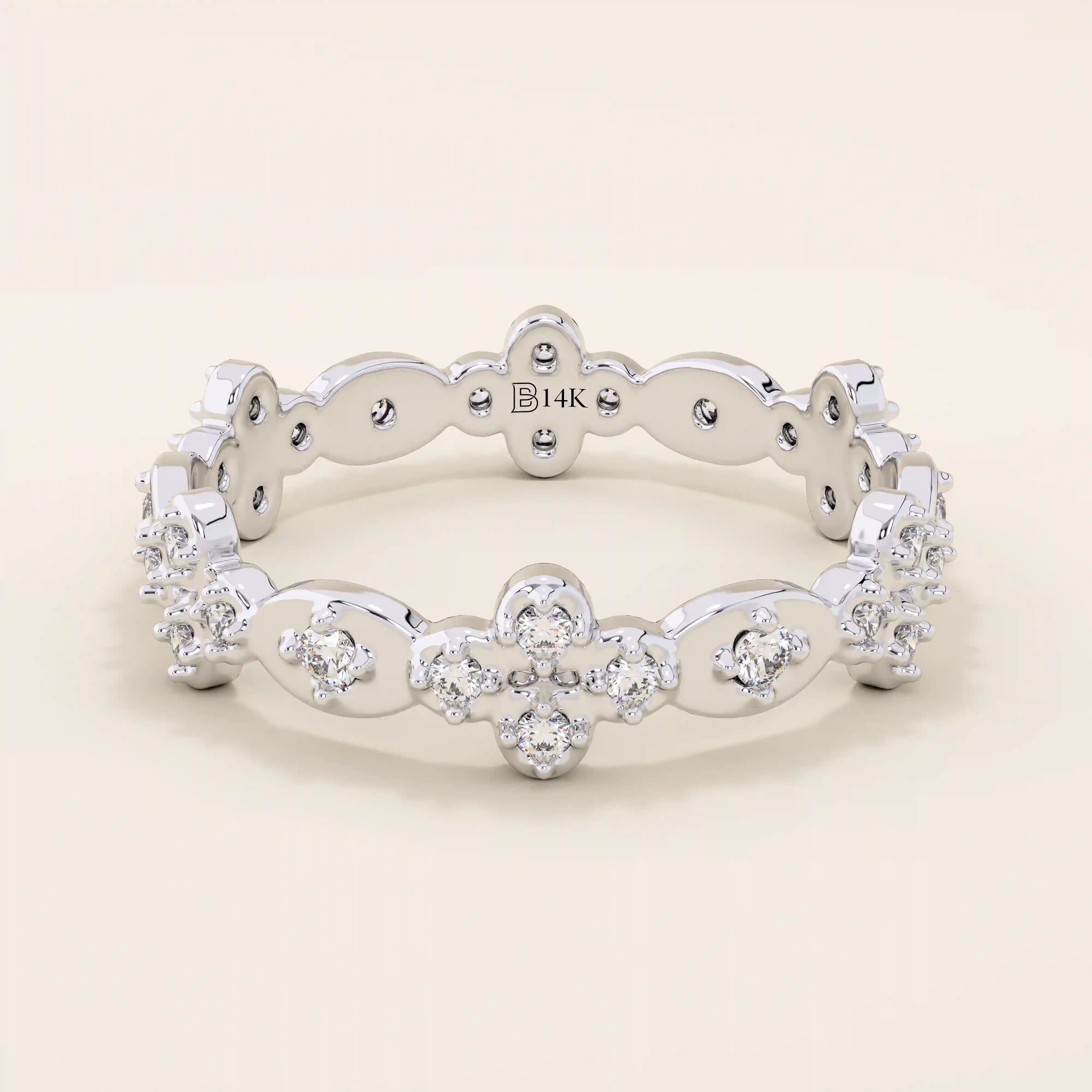 14k solid gold statement ring featuring a delicate leaf design with a sparkling moissanite. Minimalist and nature-inspired jewelry.