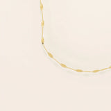 14k solid gold textured chain necklace with subtle shine and detailed finish. A classic gold chain with a unique touch. Great for everyday wear or layering.